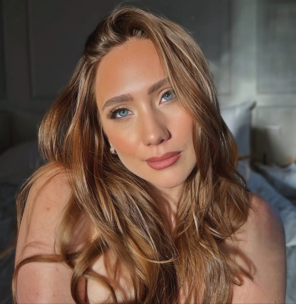 AJ Applegate as Danielle Grey at 36 Years Old as Centerfold Erotic Model and Retired Blonde Busty MILF: When the lighting hits your bedroom perfectly (2026) Face Portrait