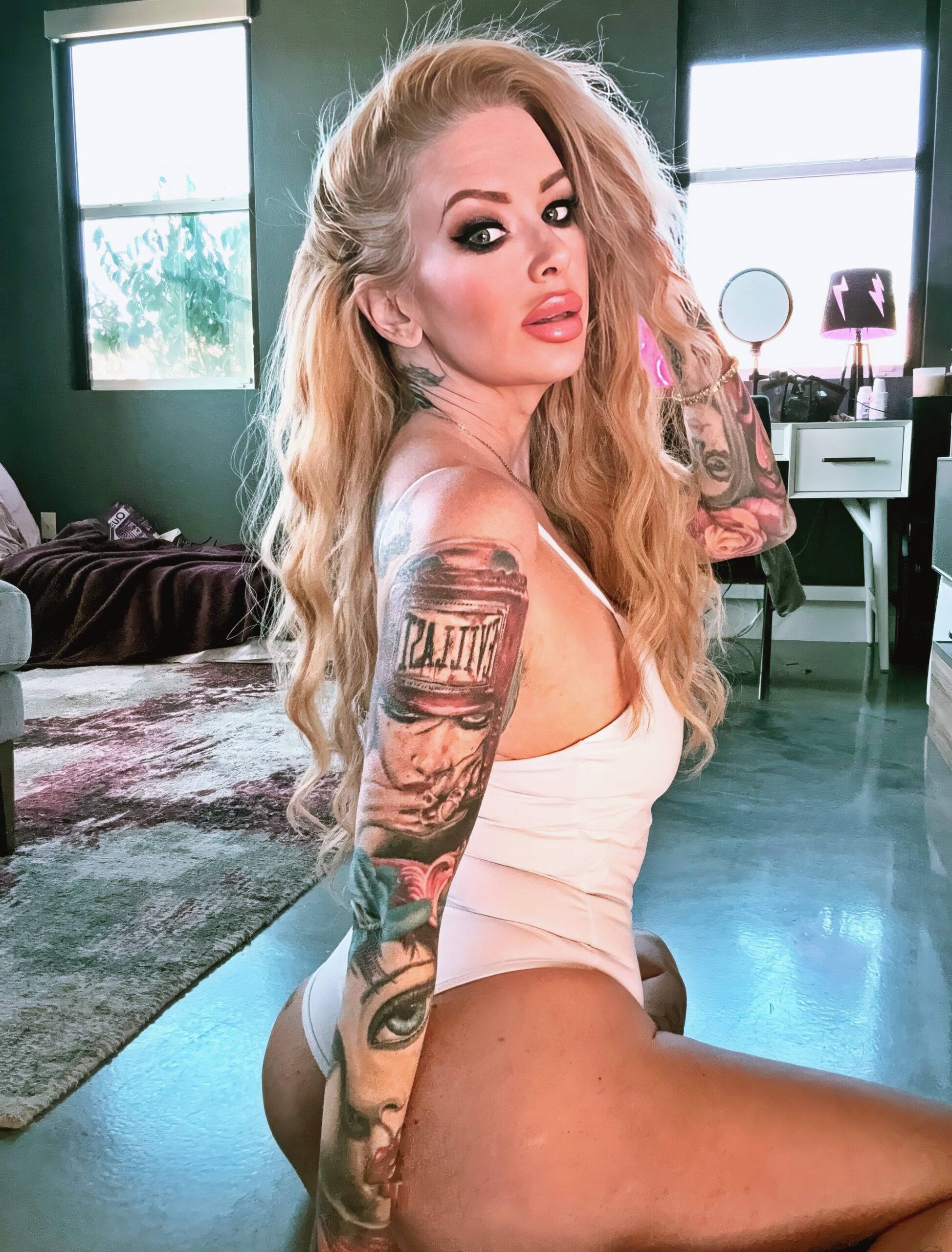 Jenna Jameson at 51 Years Old as Spieger Selfie Blonde Bombshell Queen Retired (2025) White Pink Bodysuitswim Lingerie
